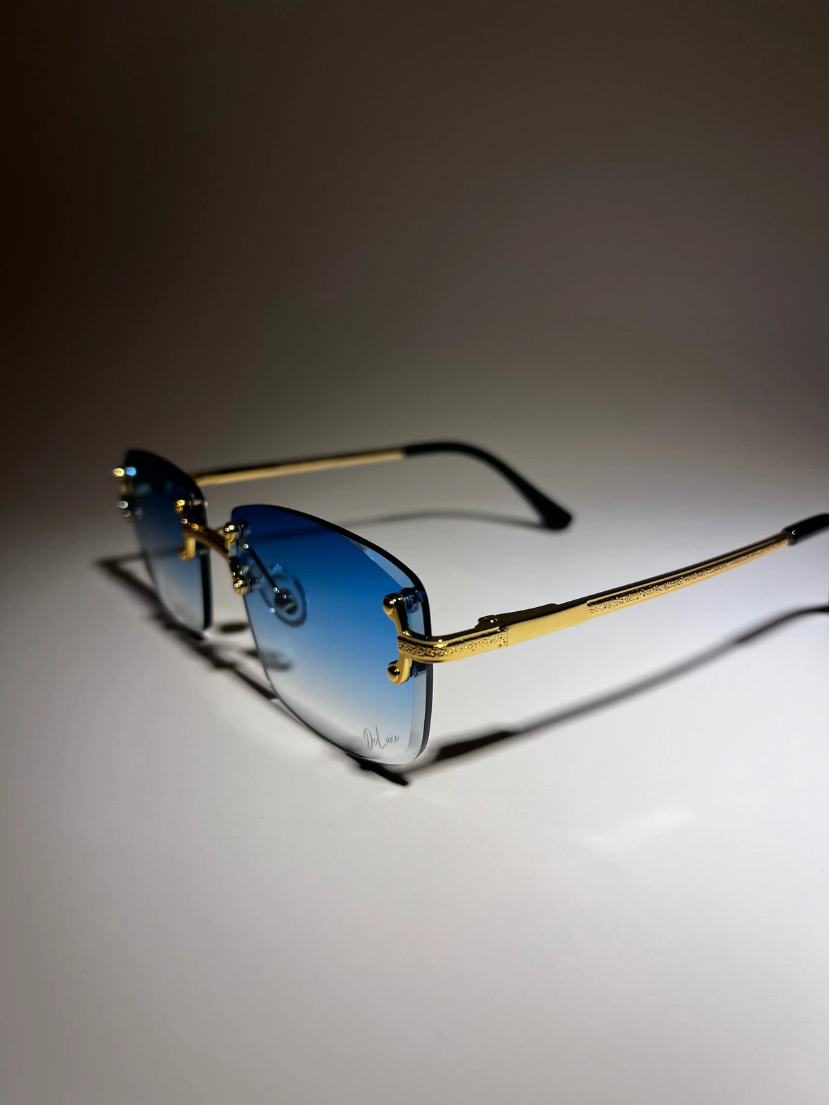 Frameless '23 UV 400 Sunglasses - DeLuxe YUL